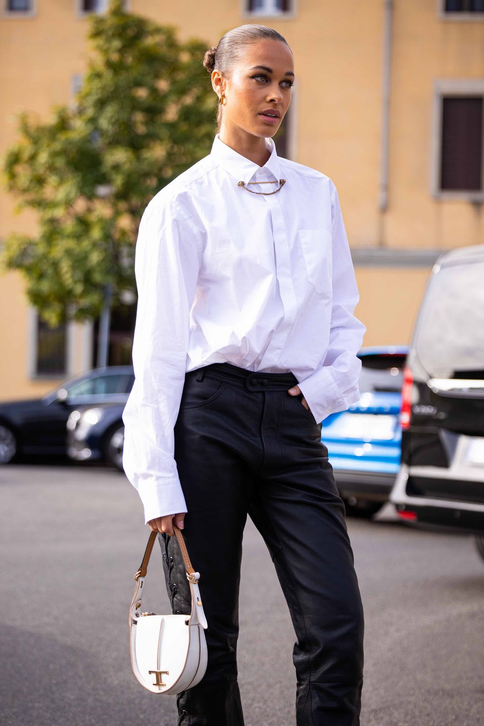 milan, italy september 23 sarah lysander is seen wearing a white shirt and bag and black leather pants outside the tod's show during the milan fashion week womenswear springsummer 2023 on september 23, 2022 in milan, italy photo by claudio laveniagetty images