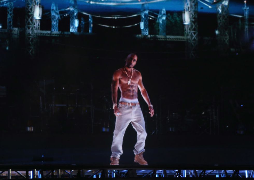 indio, ca april 15 a hologram of deceased rapper tupac shakur performs onstage during day 3 of the 2012 coachella valley music arts festival at the empire polo field on april 15, 2012 in indio, california photo by christopher polkgetty images for coachella