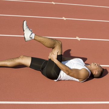 a woman lying on a track