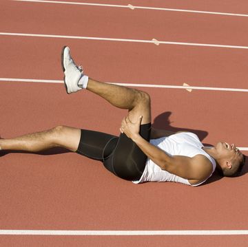 a woman lying on a track