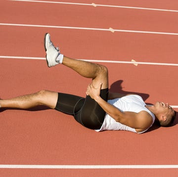 a woman lying on a track