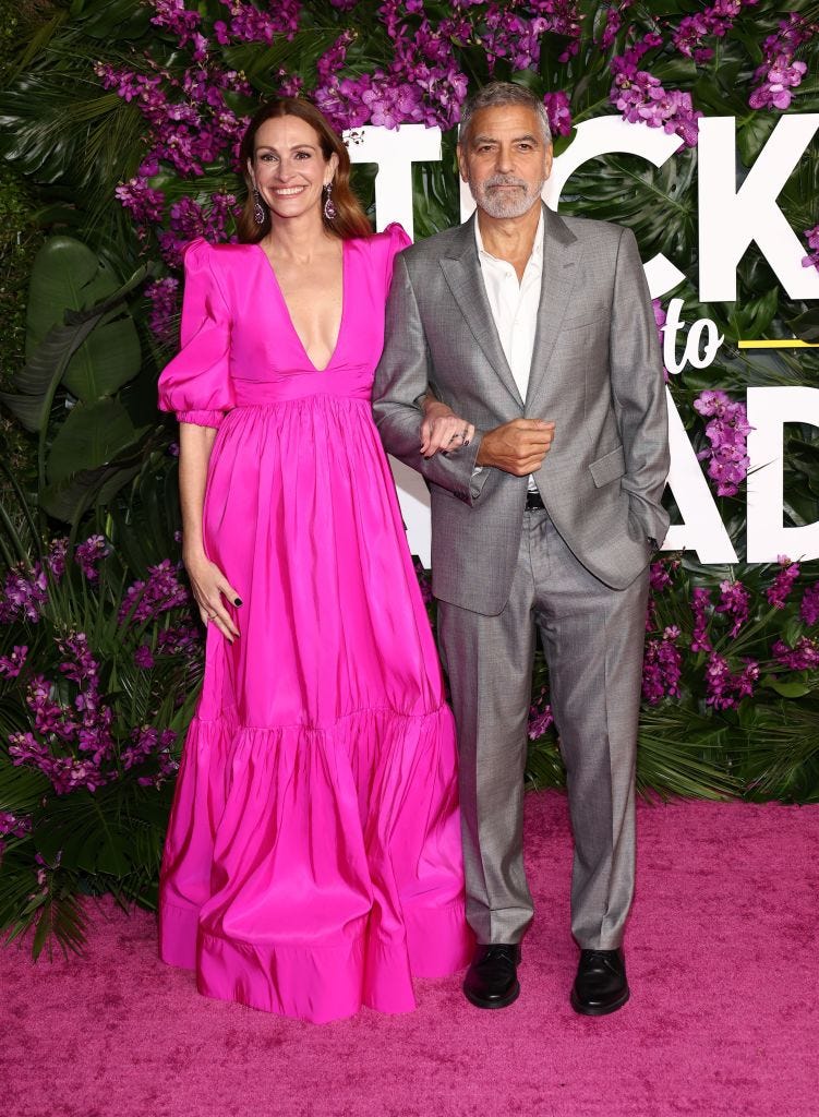 los angeles, california   october 17 l r julia roberts and george clooney attend the premiere of universal pictures ticket to paradise at regency village theatre on october 17, 2022 in los angeles, california photo by tommaso boddigetty images