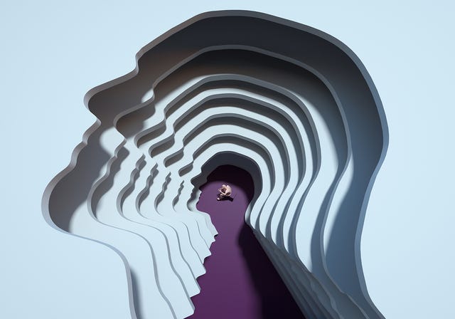 a conceptual representation of layers forming a tunnel with a figure seated at the bottom