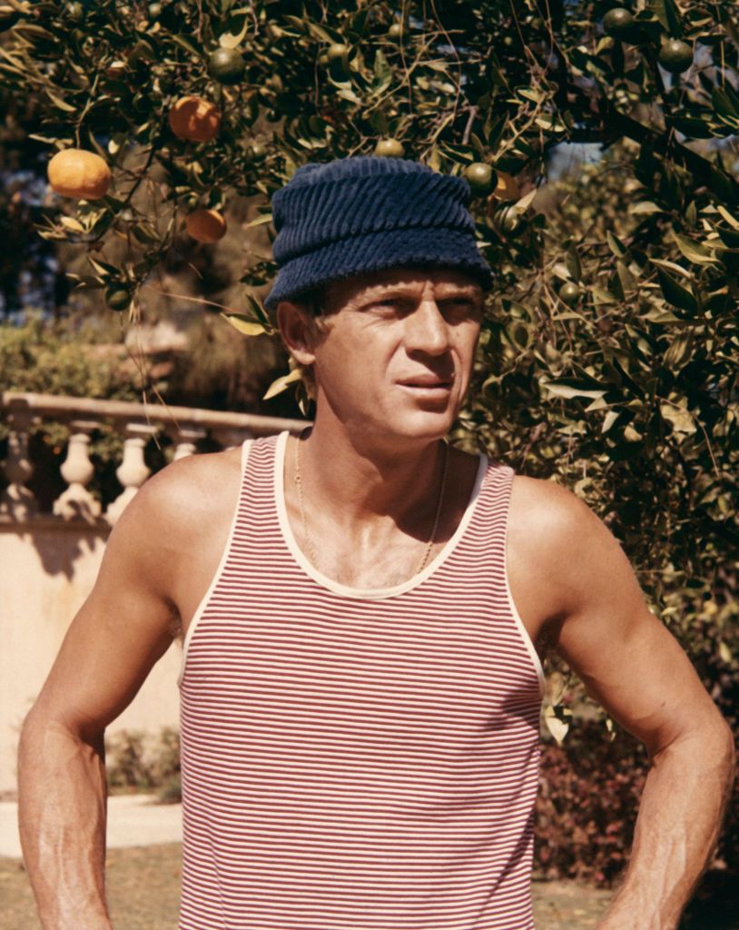 steve mcqueen wearing vest and blue hat circa 1972 photo by screen archivesgetty images