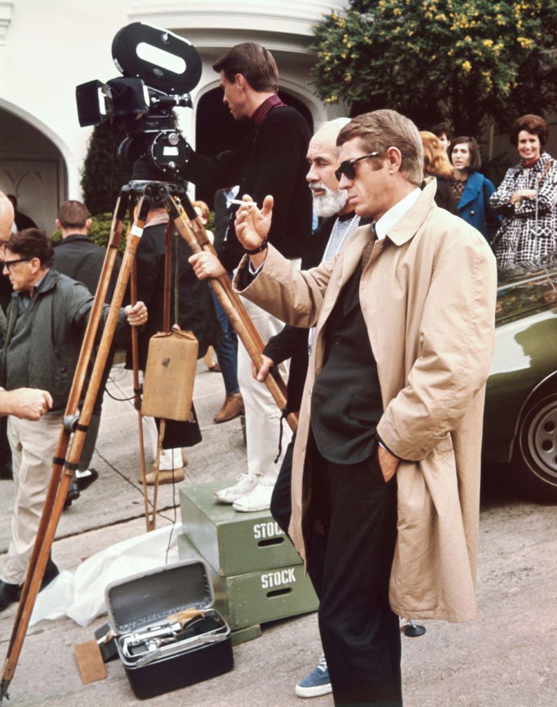 steve mcqueen, in sunglasses smoking cigarette, discusses a scene with cinematographer bill fraker while filming bullitt 1968 photo by screen archivesgetty images