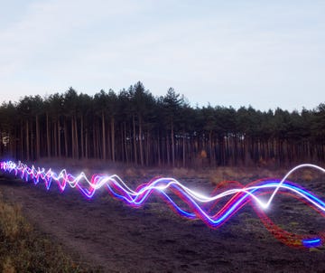 red, blue and white light trails on heath