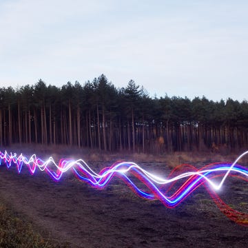 Red, blue and white light trails on heath. red, blue and white light trails on heath