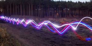 red, blue and white light trails on heath