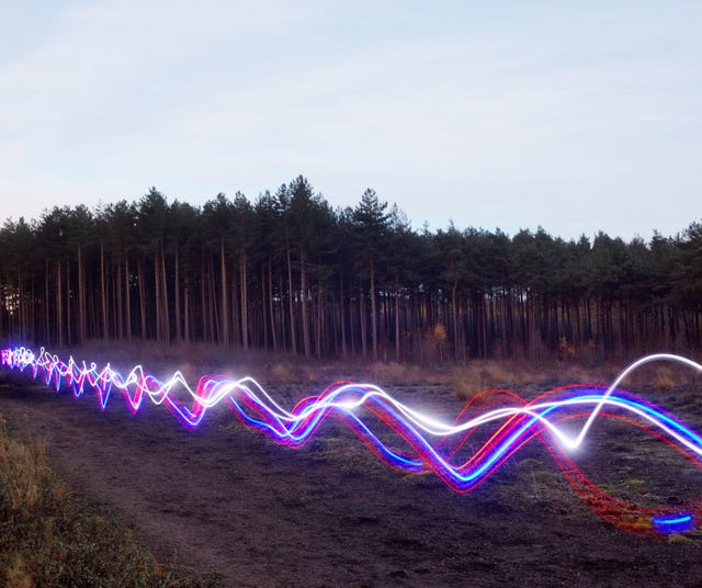 red, blue and white light trails on heath