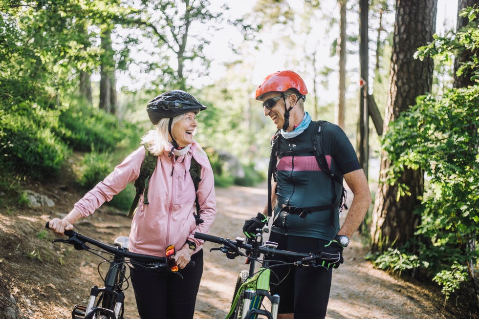 a man and woman on bicycles