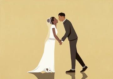 A couple exchanging affection in a wedding setting