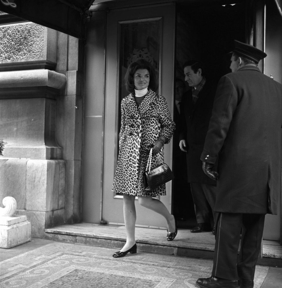 jackie kennedy leaving a manhattan building wearing a leopard skin coat and white turtleneck photo by sal trainawwdpenske media via getty images
