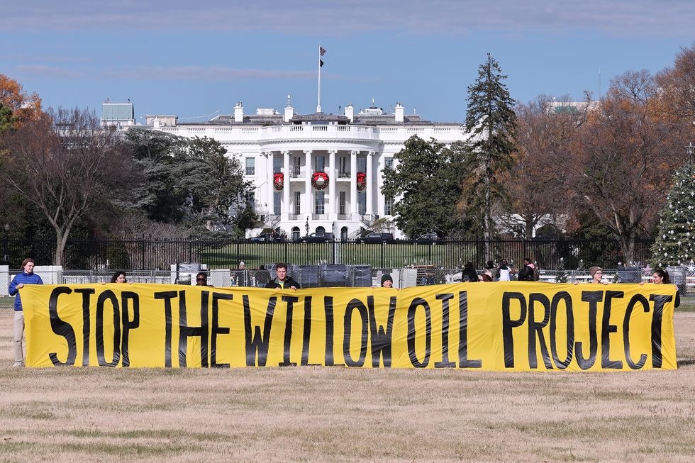 washington, dc december 02 students and community members demand president biden stop the willow project by unfurling a banner on the ellipse outside the white house on december 02, 2022 in washington, dc photo by paul morigigetty images for this is zero hour