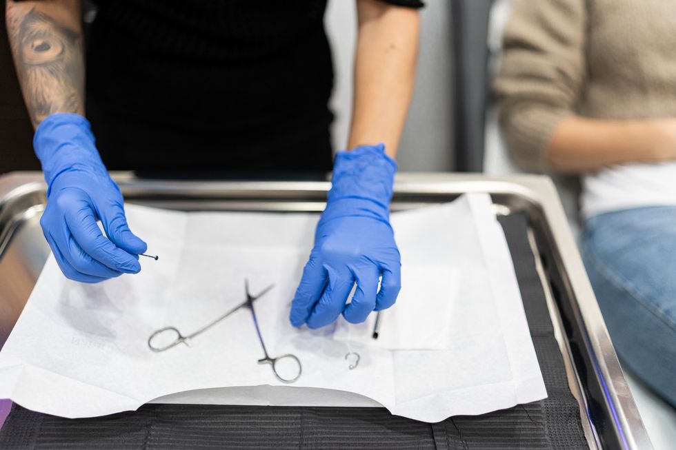 piercer preparing piercing material for piercing with unfocused client