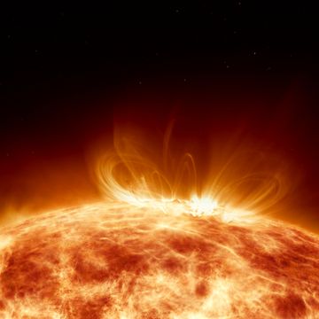 earths sun in outer space artistic concept 3d illustration as lower third shot of solar surface with powerful bursting flares and star protuberances erupting with magnetic storms and plasma flashes