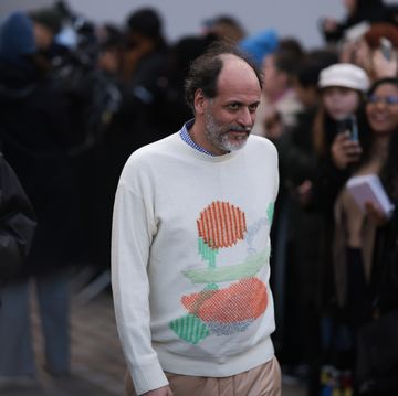 paris, france january 21 luca guadagnino seen wearing a white and orange and green sweater and beige pants , outside loewe show, during pariser fashion week on january 21, 2023 in paris, france photo by jeremy moellergetty images