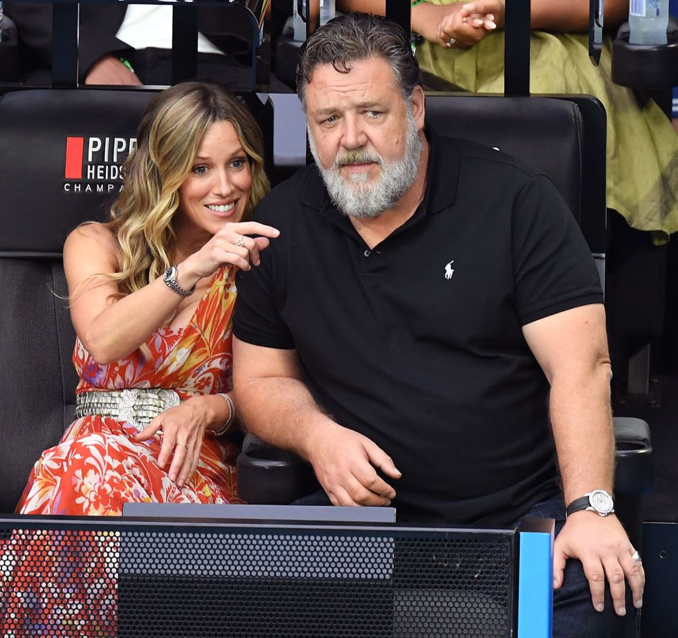 melbourne, australia january 28 russell crowe r and girlfriend britney theriot l watch the women’s singles final match between elena rybakina of kazakhstan and aryna sabalenka during day 13 of the 2023 australian open at melbourne park on january 28, 2023 in melbourne, australia photo by james d morgangetty images