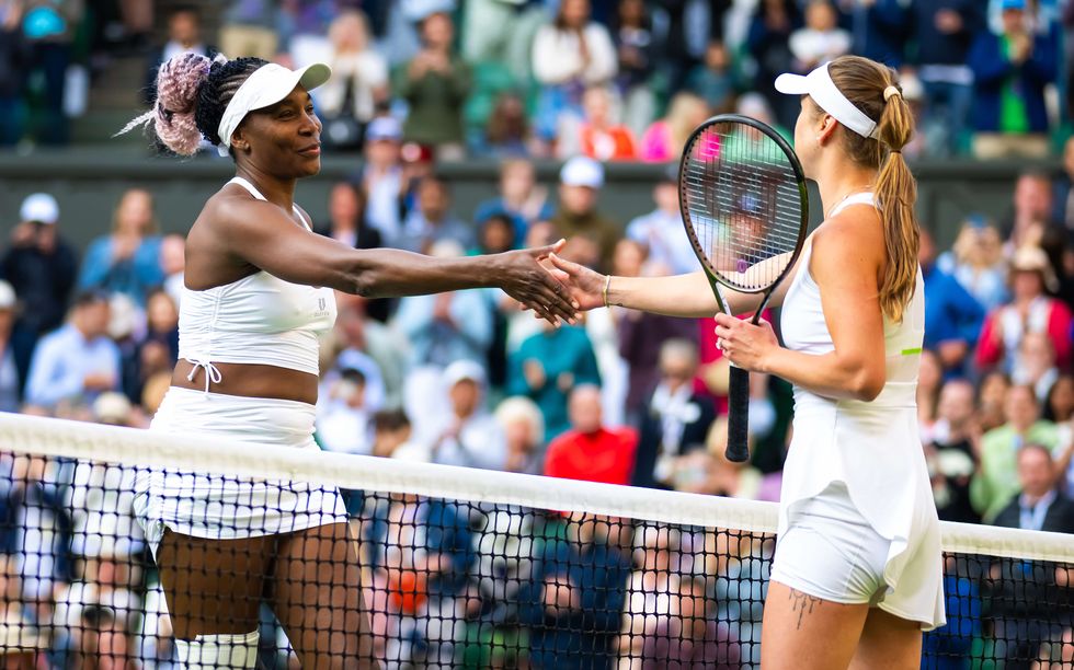 london, england july 03 venus williams of the united states and elina svitolina of ukraine shake hands at the net after the first round during day one of the championships wimbledon 2023 at all england lawn tennis and croquet club on july 03, 2023 in london, england photo by robert prangegetty images