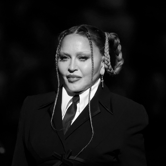 madonna the popstar in braids and a suit