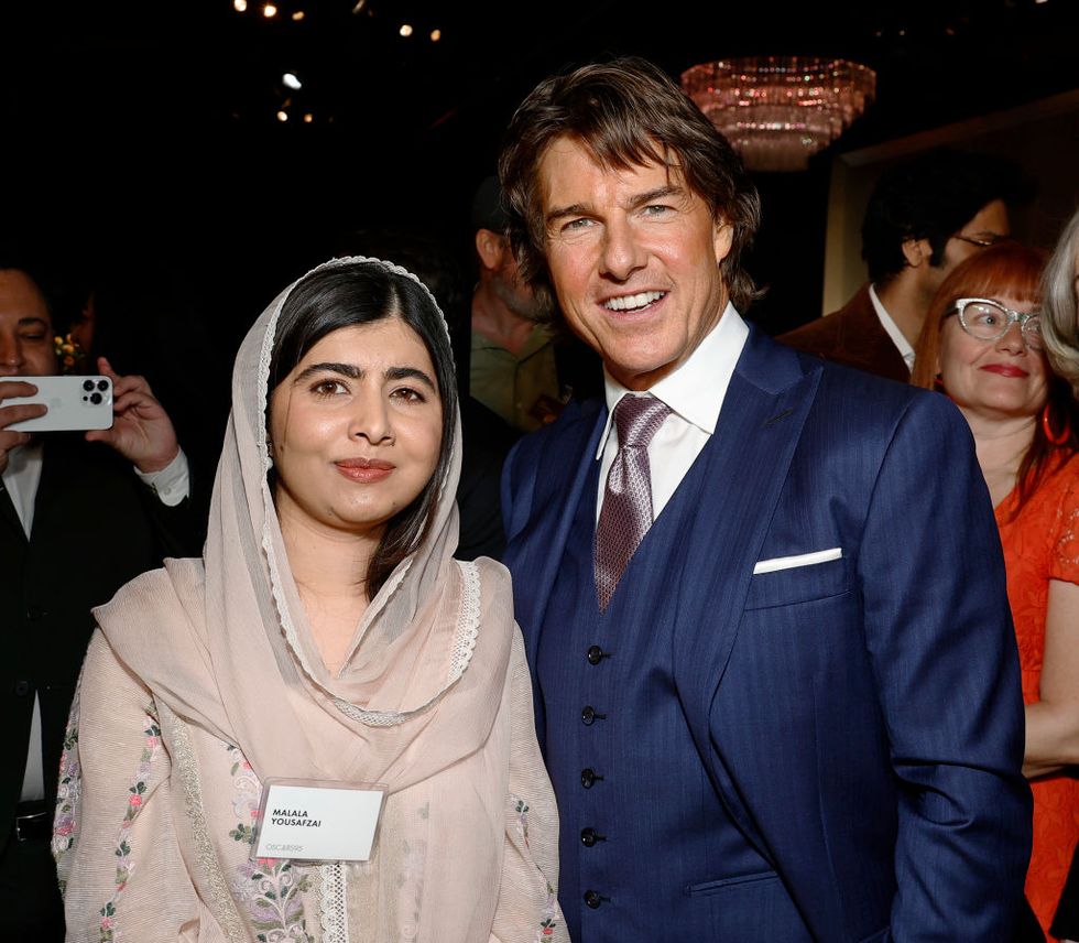 beverly hills, california february 13 l r malala yousafzai and tom cruise attend the 95th annual oscars nominees luncheon at the beverly hilton on february 13, 2023 in beverly hills, california photo by frazer harrisongetty images