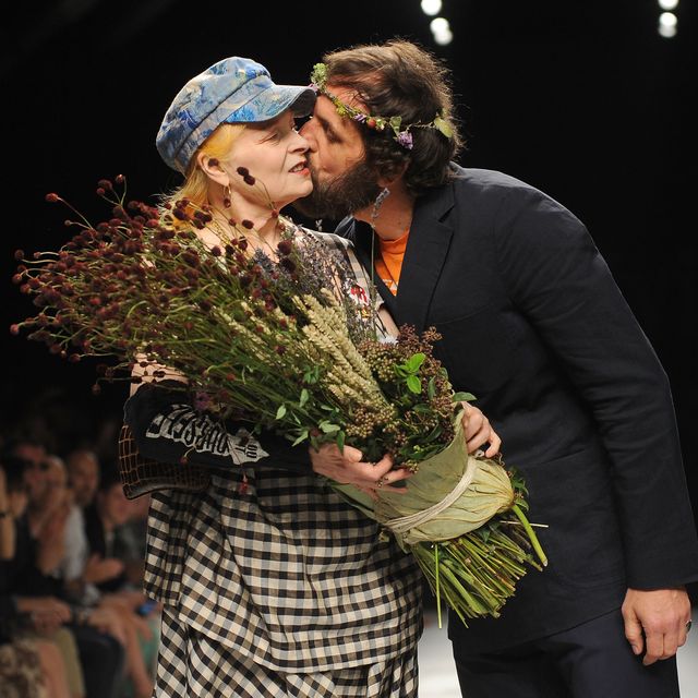 lmilan, italy june 24 designers vivienne westwood l and husband andreas kronthaler acknowledge the applause of the audience after the vivienne westwood show as part of milan fashion week menswear springsummer 2013 on june 24, 2012 in milan, italy photo by stefania dalessandrogetty images