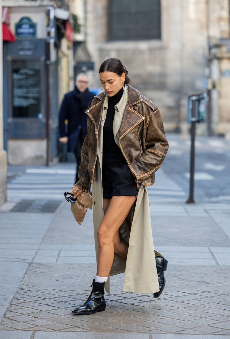Irina Shayk Layers a Distressed Leather Jacket over a Long Trench Coat