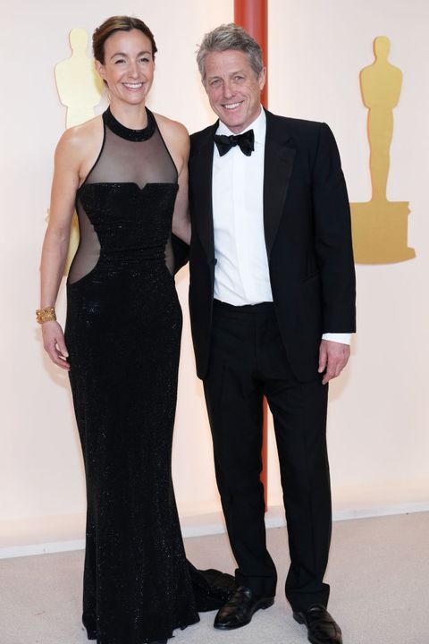 hollywood, california march 12 l r anna eberstein and hugh grant attends the 95th annual academy awards on march 12, 2023 in hollywood, california photo by kevin mazurgetty images