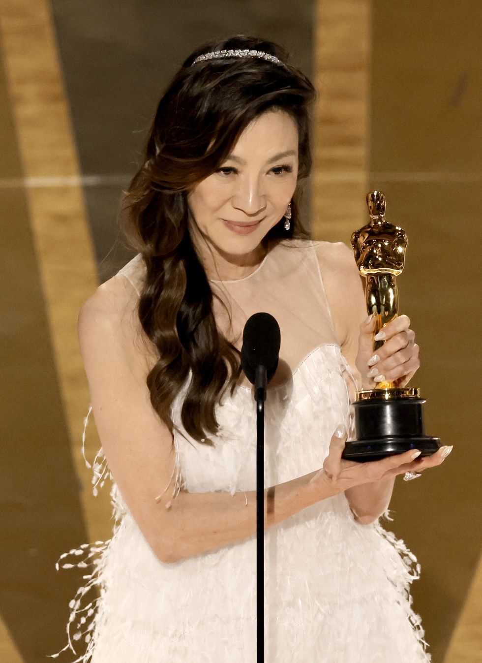 hollywood, california march 12 michelle yeoh accepts the best actress award for everything everywhere all at once onstage during the 95th annual academy awards at dolby theatre on march 12, 2023 in hollywood, california photo by kevin wintergetty images