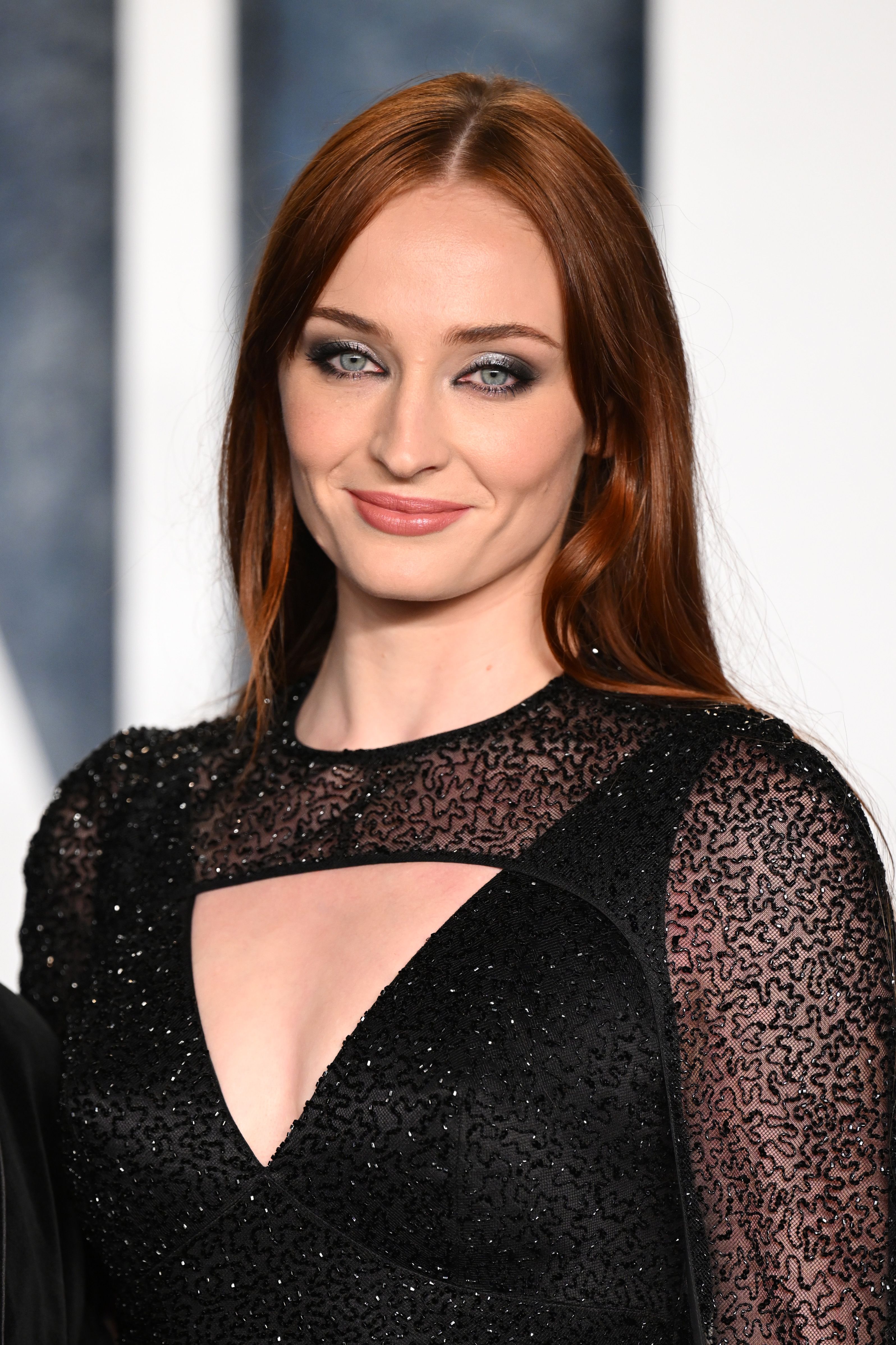 Sophie Turner shows off her newly dyed red hair
