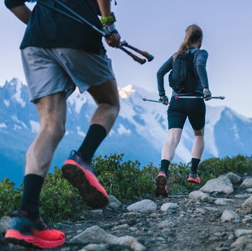 Trail runners bound along mountain trail chamonix, haute savoie