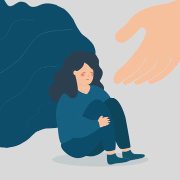 A hand helps a woman to get rid of stress and depression. Sad girl needs support, and care due to psychological problems. Mental health disorder concept a hand helps a woman to get rid of stress and depression. sad girl needs support, and care due to psychological problems. female teenage crying her face. mental health disorder and divine help concept