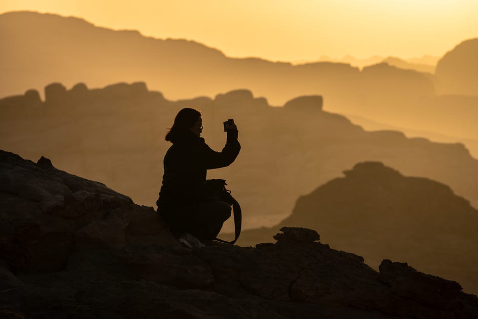 tourist enjoy the sunset at wadi rum desert in jordan in the middle east