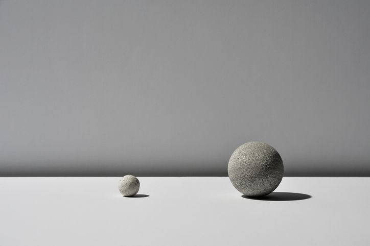 The ball of two stones on white background