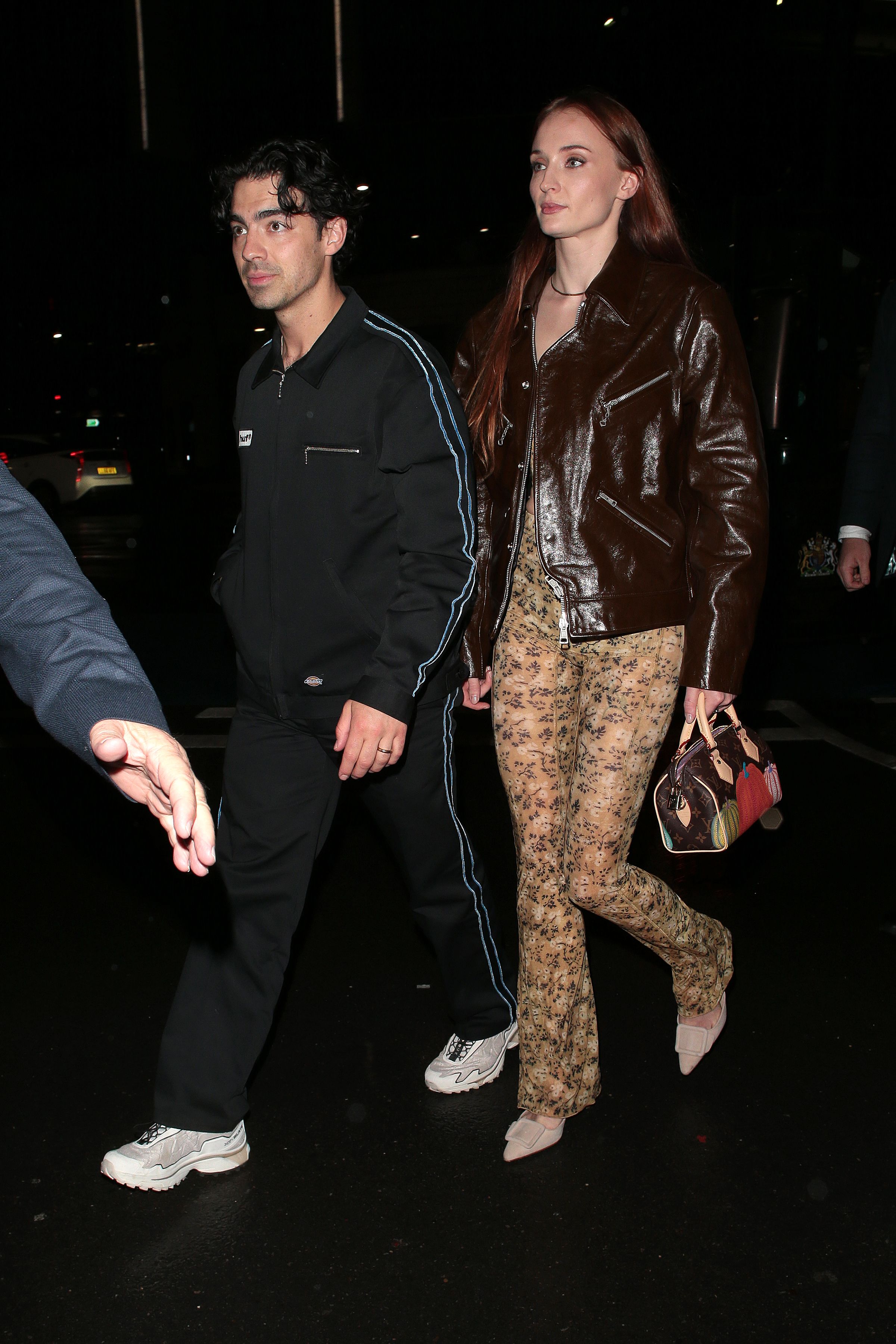 Sophie Turner Goes Sleek in Louis Vuitton Peter Pan Jumpsuit & Pointy Heels  for Netflix's 'Jonas Brothers Family Roast