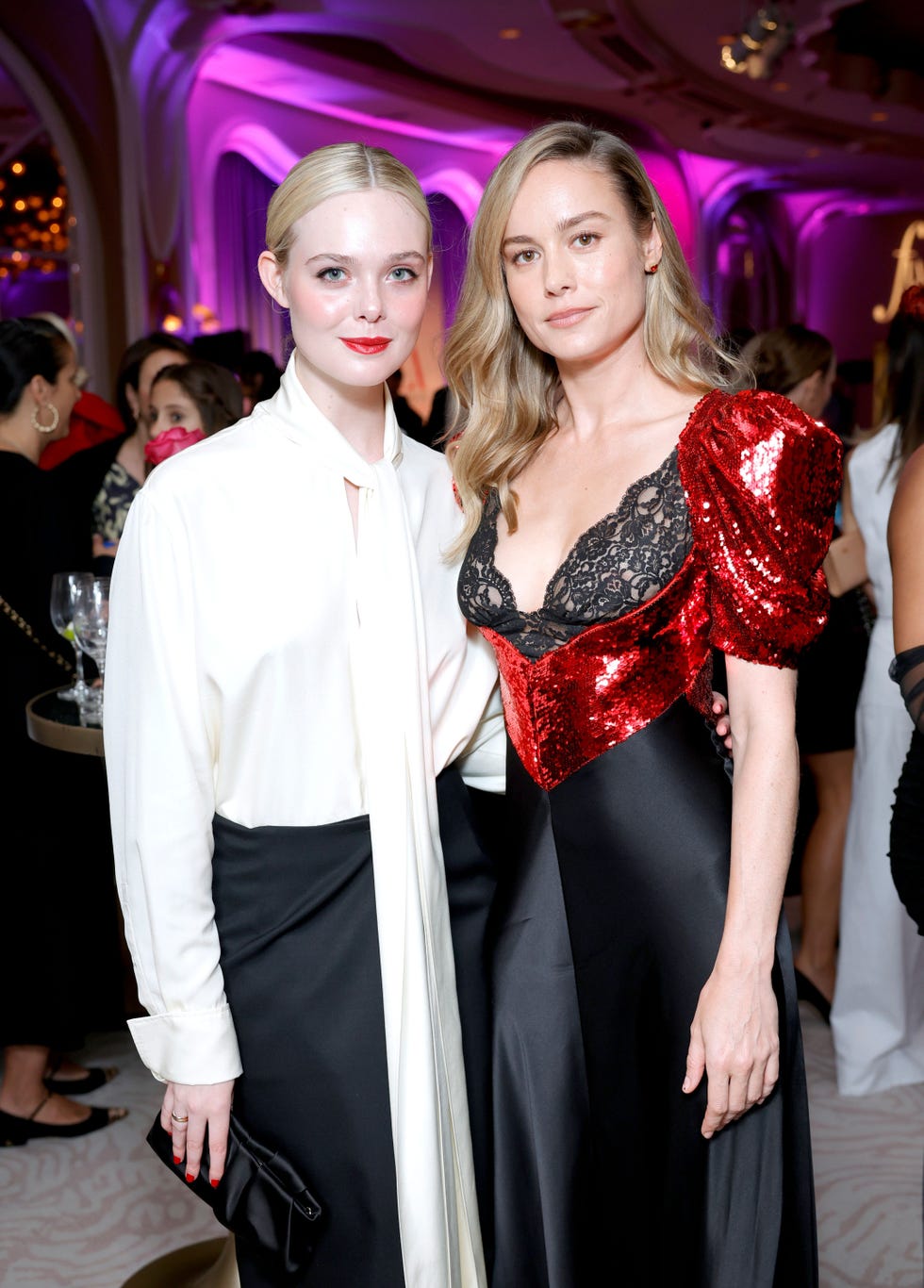 Elle Fanning Wears a Pussy Bow Blouse with a Train to the Fashion Los  Angeles Awards