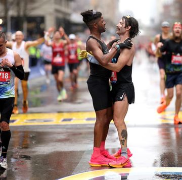 boston, massachusetts april 17 knox robinson l and jordan phelps r celebrate after crossing the finish line during the 127th boston marathon on april 17, 2023 in boston, massachusetts photo by maddie meyergetty images