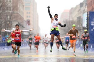 boston, massachusetts april 17 fernando ferreira celebrates in the rain as he crosses the finish line during the 127th boston marathon on april 17, 2023 in boston, massachusetts photo by maddie meyergetty images