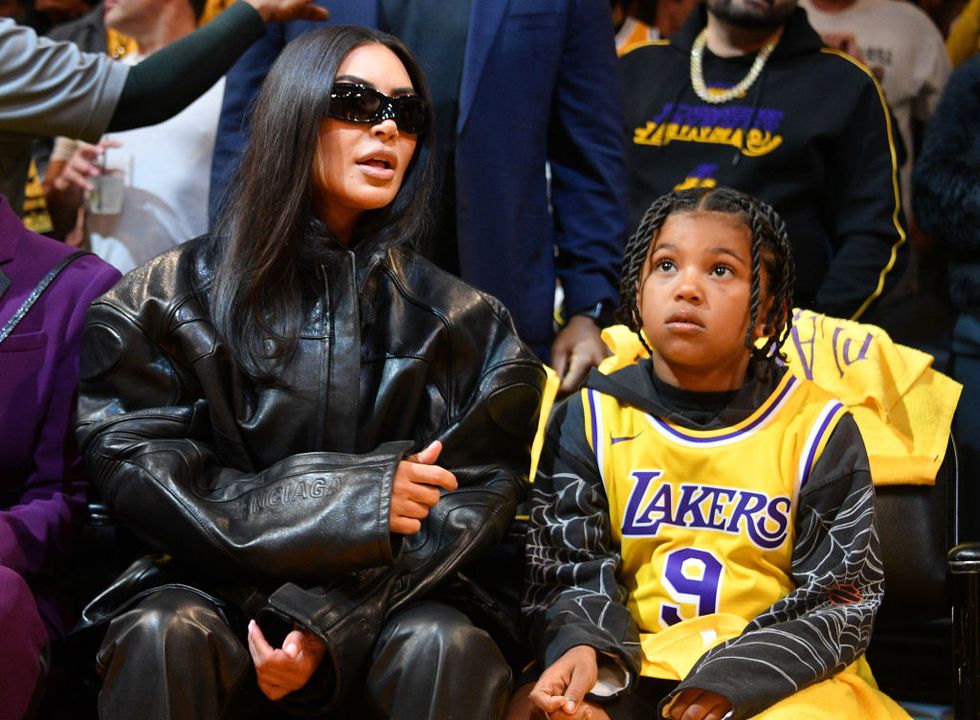 los angeles, california april 24 kim kardashian and saint west attend a basketball game between the los angeles lakers and the memphis grizzlies at cryptocom arena on april 24, 2023 in los angeles, california photo by allen berezovskygetty images