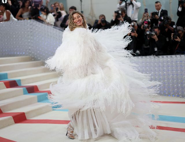 Gisele Bündchen Wore an Extremely Long Feathered Cape to the 2023 Met Gala