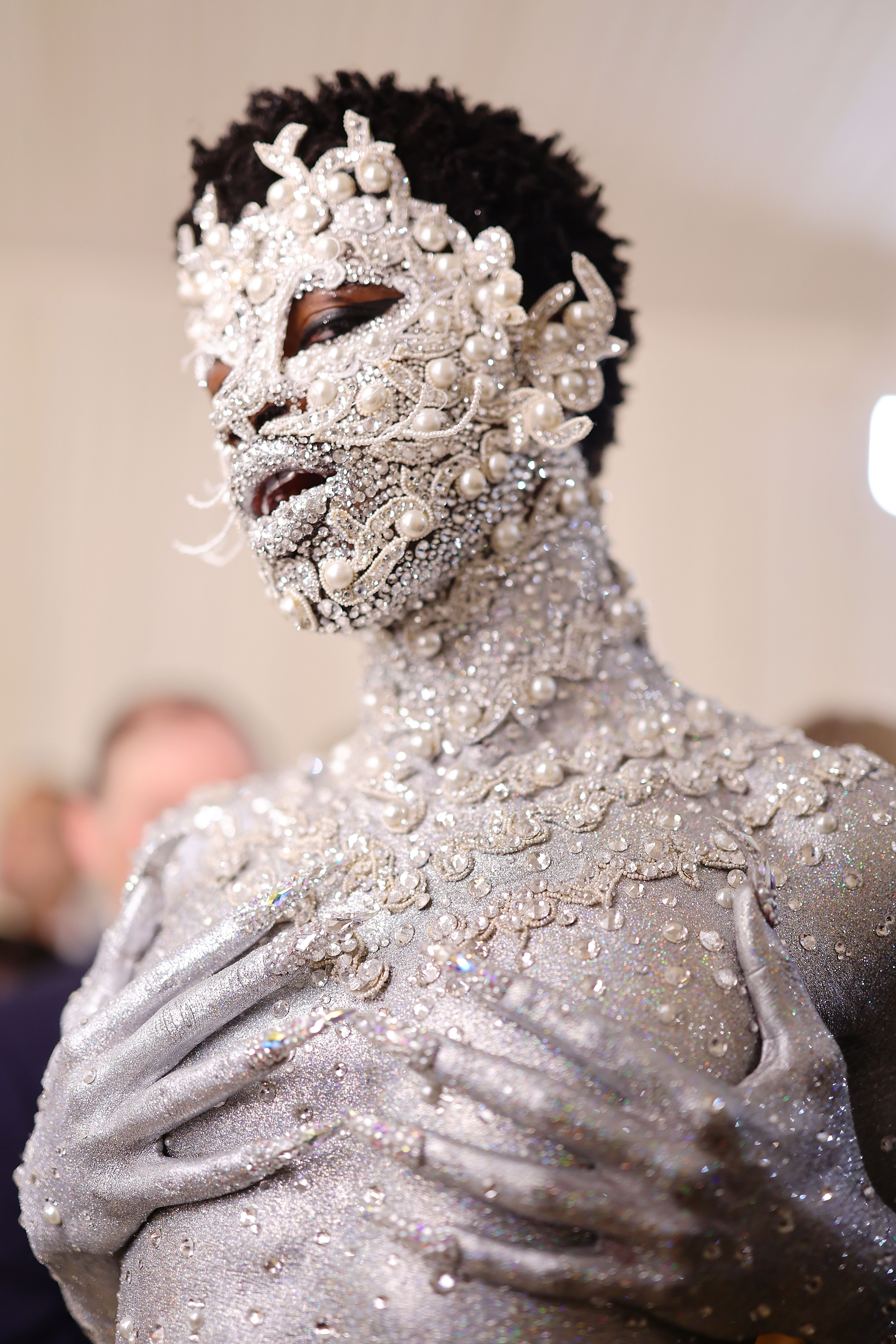 Lil Nas X covers body in silver paint, rhinestones for 2023 Met Gala