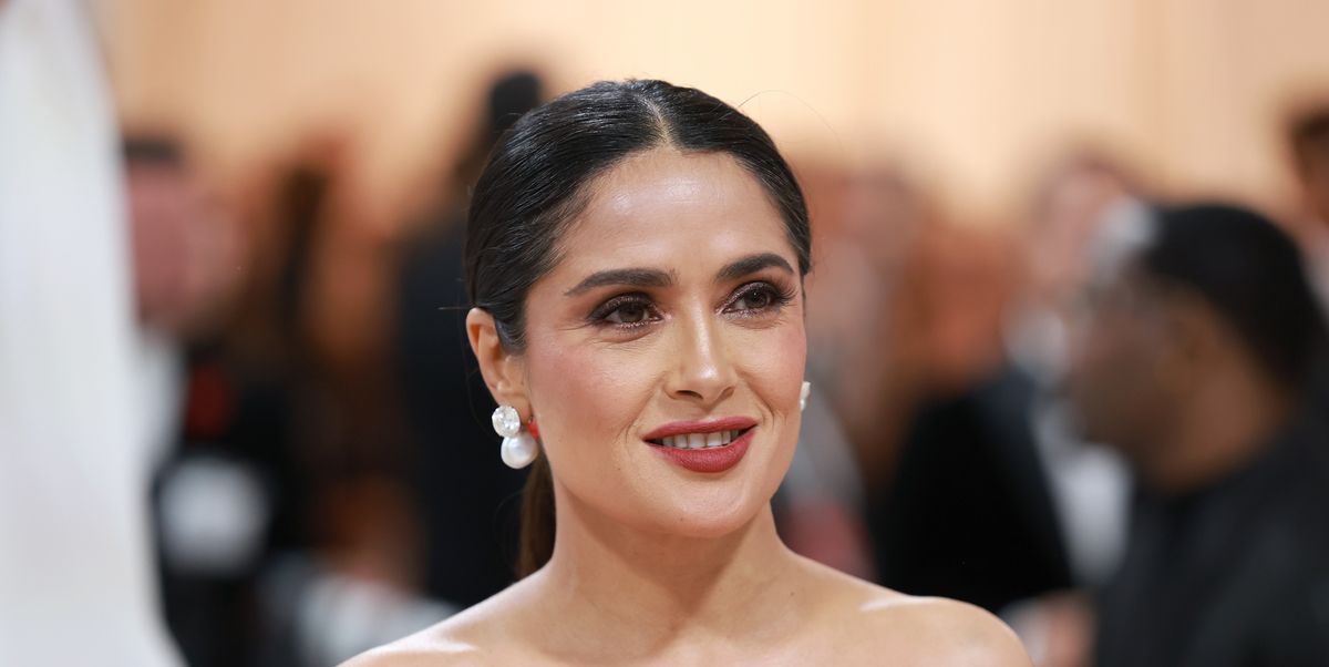 Salma Hayek Wore Red Bustier Gown With Sheer Lace Leg Slit to 2023 Met Gala