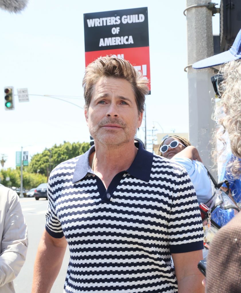 los angeles, ca may 02 rob lowe and members of the writers guild of america wga and its supporters picket outside of paramount pictures on may 02, 2023 in los angeles, california hollywood writers have gone on strike in a dispute over payments for streaming services photo by rodin eckenrothgetty images