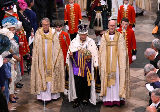 london, england may 06 king charles iii departs the coronation service at westminster abbey on may 06, 2023 in london, england the coronation of charles iii and his wife, camilla, as king and queen of the united kingdom of great britain and northern ireland, and the other commonwealth realms takes place at westminster abbey today charles acceded to the throne on 8 september 2022, upon the death of his mother, elizabeth ii photo by gareth cattermolegetty images
