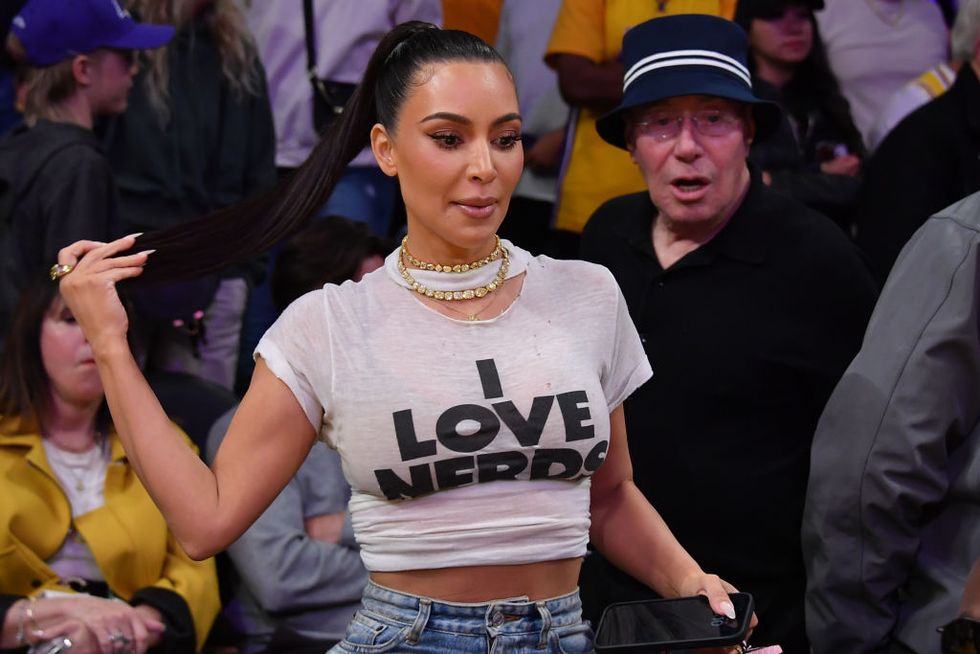 Kim Kardashian Sits Courtside at NBA Game in I Love Nerds Tee