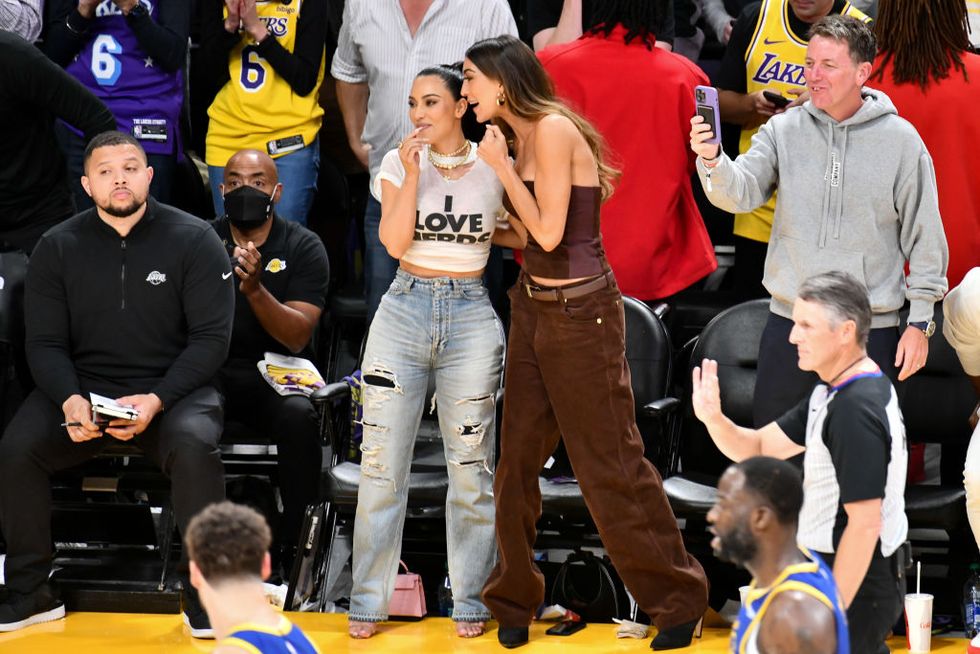 los angeles, california may 08 kim kardashian l and sarah staudinger attend a playoff basketball game between the los angeles lakers and the golden state warriors at cryptocom arena on may 08, 2023 in los angeles, california photo by allen berezovskygetty images