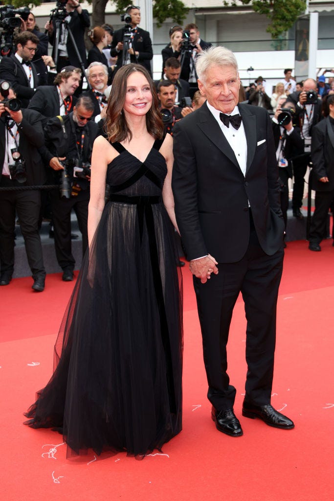 cannes, france may 18 harrison ford and calista flockhart attend the indiana jones and the dial of destiny red carpet during the 76th annual cannes film festival at palais des festivals on may 18, 2023 in cannes, france photo by daniele venturelliwireimage