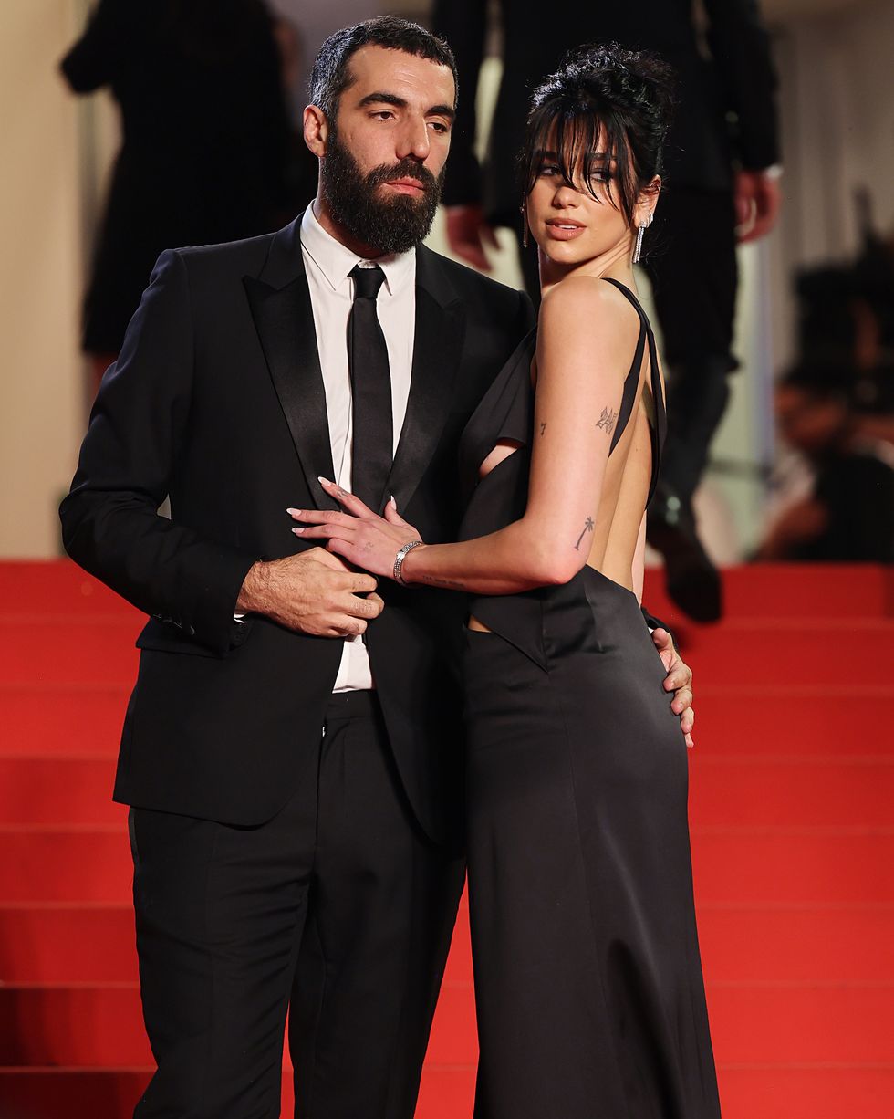 romain and dua pose on the red carpet