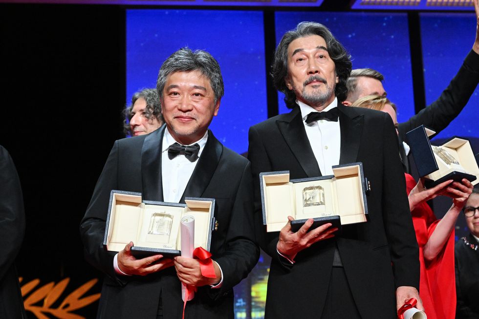 chopard palme d'or pre cannes film festival red carpet 2024 high jewellery cannes, france may 27 hirokazu kore eda and kōji yakusho pose with their awards during the closing ceremony during the 76th annual cannes film festival at palais des festivals on may 27, 2023 in cannes, france photo by stephane cardinale corbiscorbis via getty images