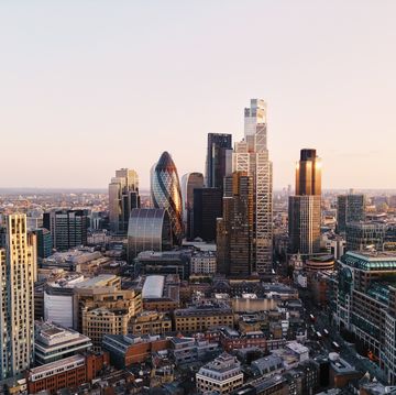 uk, london, elevated view over city financial district skyline at sunset