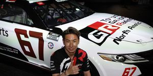 le mans, france june 07 kamui kobayashi of japan poses next to the 67 toyota camry trd car he will drive at indianapolis motor speedway later this year in a press conference ahead of the 100th anniversary of the 24 hours of le mans at the circuit de la sarthe june 7, 2023 in le mans, france photo by chris graythengetty images